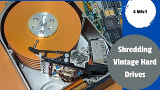 Shredding a vintage 1989 computer hard drive.
