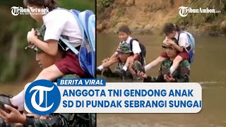 Viral Video Aksi Anggota TNI Gendong Anak SD di Pundak Sebrangi Sungai di Perbatasan