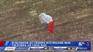 F-16 fighter crashes into California warehouse, pilot ejects