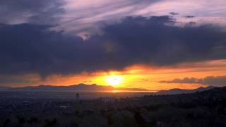 Time Lapse Sunset HD Video 1080p Footage Views of Setting Sun Going Down over a City and Coastline