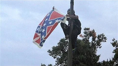 Woman Removes Confederate Flag From S.C. Capitol