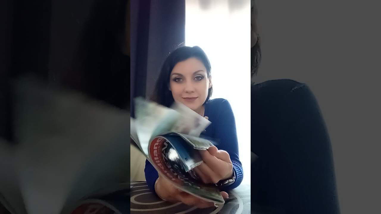 ASMR weekly ads page turning, finger licking