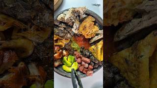 Serving you hot soft  Kenkey with an assortment of protein. What are you adding or removing?