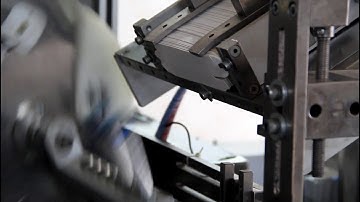 Continuous motion cartoning machine for tube packaging