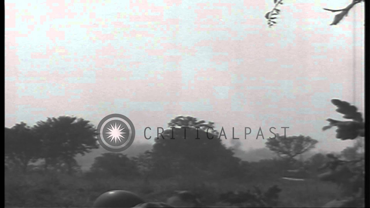 US 4th Division, 8th Infantry, 3rd Battalion soldiers and tanks attack enemy posi...HD Stock Footage