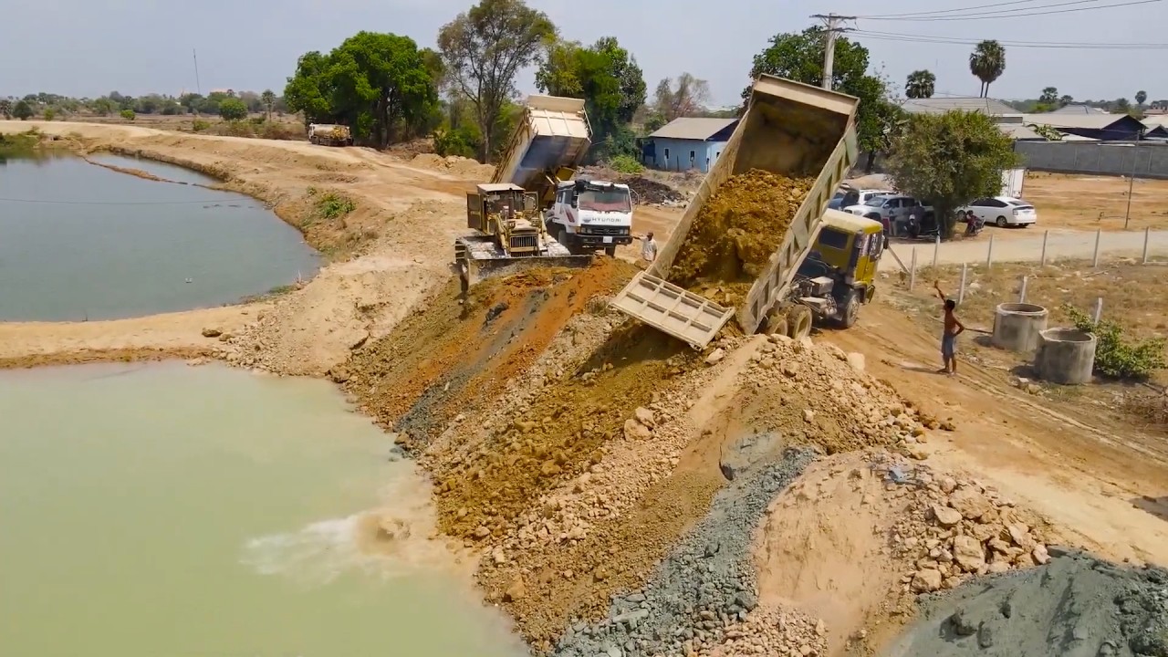 Government Project Construction of Canal with Various machine activities Use Bulldozer Push Soil