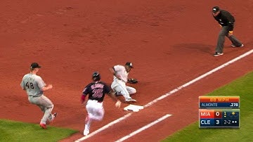MIA@CLE: Scruggs makes a tough play at first