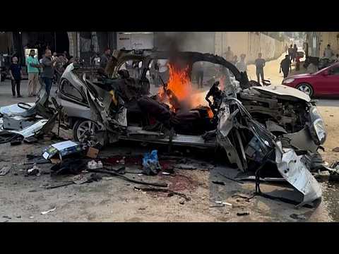 Israeli strike on Gaza vehicle kills two Hamas engineers, 13 wounded