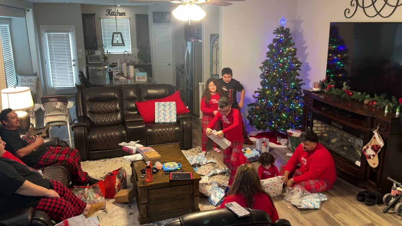 Jesse and family opening Christmas presents 🎁 December 2025