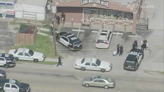 Officer, suspect exchange gunfire