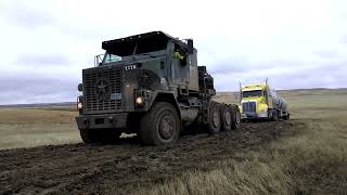 Oshkosh m1070 pulls a truck