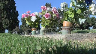 Cemetery asking visitors to remove or flip vases
