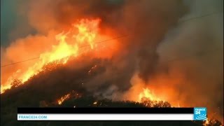 Us - california blue cut wildfire keeps growing due to high winds and
temperatures