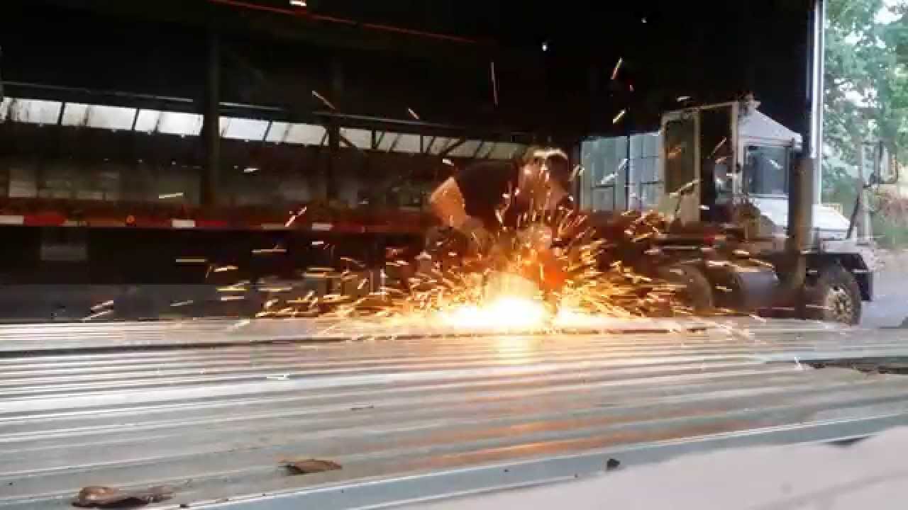 Cutting galvanized roof deck with a demo saw