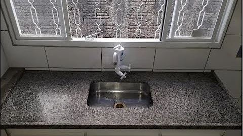 Como tirar manchas de cimento do aço inox?