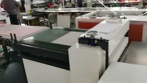 Paper lining machine with automatic visual positioning