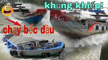 Ghe sà lan chạy như hội đua ghe.sà lan tuộc cống nước chảy như thác đổ tại cống 7 cửa Trà Vinh