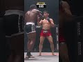 ONE Championship fighters trade rapid leg kicks  shin to shin collisions echo  Camera  low mat leve