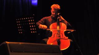 Peter Gregson of Michael Price Trio playing the cello in Istanbul
