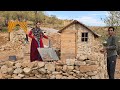 Helping to build the wall of Shiva's shelter, a nomadic mother