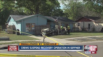 sinkhole swallows man, search suspended