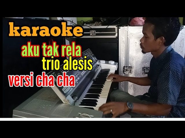 AKU TAK RELA _ KARAOKE TRIO ALEXIS | VERSI CHA CHA KN7000 class=