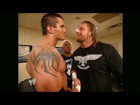 Randy Orton celebrates his victory with Evolution! RAW 07/26/2004