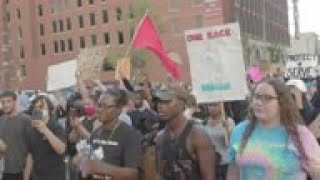 Protests begin peacefully outside Trump rally