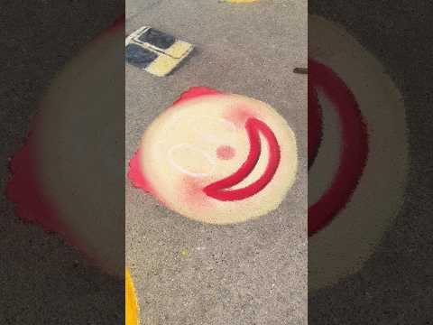 Attempting to Chalk the Clown Emoji Before the Rain Comes 🤡
