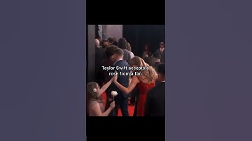 Taylor Swift accepts a rose from a fan ❤️ |  #taylorswift #grammys #grammys2025 #ttpd