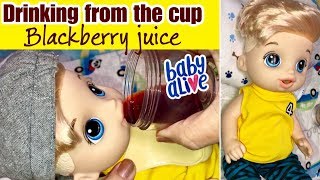 Baby Alive SWEET SPOONFULS feeding attempt from the feeding cup with BLACK CHERRY KOOLAID
