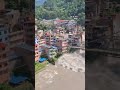 Grozovite poplave rušile mostove in hiše