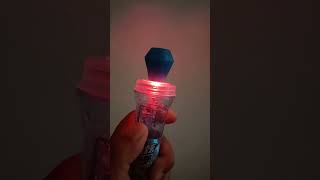 Flashing microphone lollipop candy