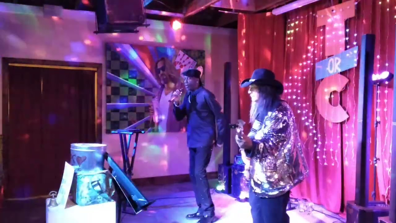 Let it rain The All Knighters Band Johnny Kreis bassist and Lawrence 'Ali 'Lyte vocalist 