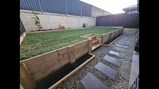 Timber retaining wall construction, building a treated pine retaining wall, Timber wall installation