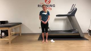 Modified calf stretch with towel roll for heel pain