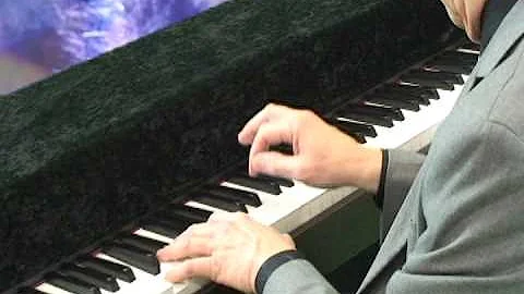 Pastor Roy plays Christmas piano