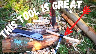 Natural debris bushcraft shelter build,(scotch eyed auger) Framing the roof.