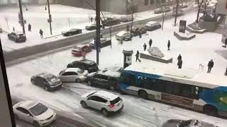 Vehicles sliding and piling up in snowy Montreal