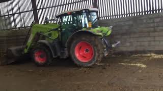 Claas loading a dung spreader at Blackerne farm Castle Douglas part 2