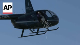 15,000 marshmallows dropped from helicopter at Michigan park