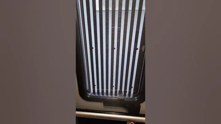 Room Darkening RV CloZures Shutter installed inside of a Grand Design