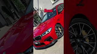 Оклейка автомобиля BMW M5 competition полиуретановой пленкой сочного алого оттенка