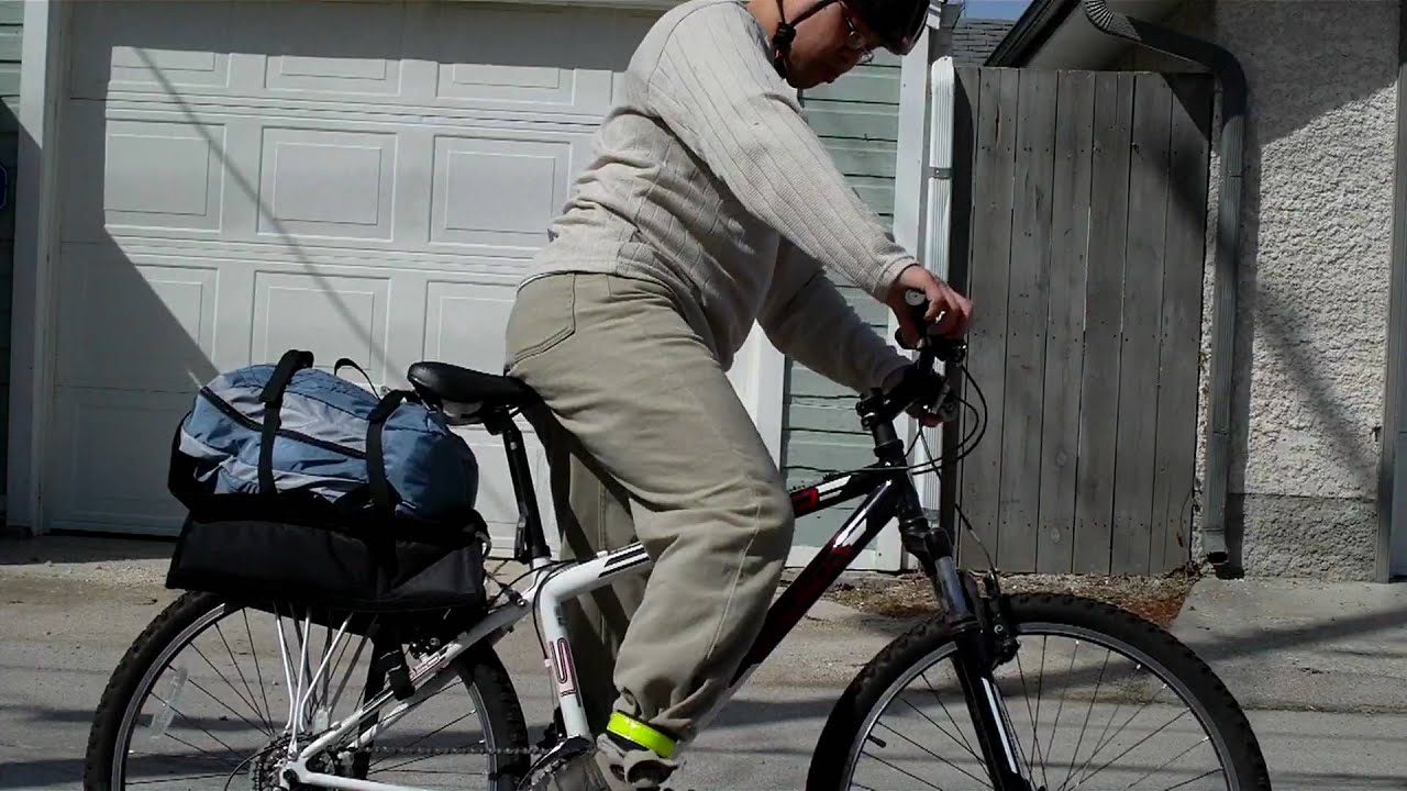 Backpack on Bike - YouTube