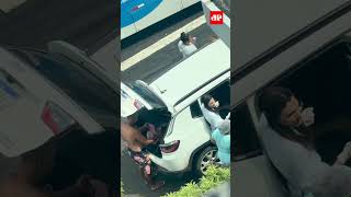 Doctor Ders Baby In Car Outside Maternity Hospital In Rio De Janeiro shorts