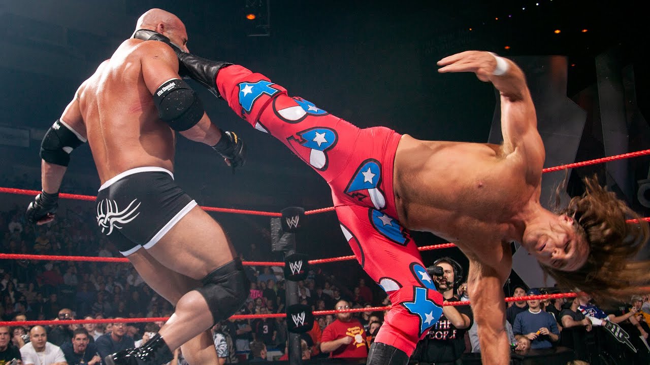 Batista returns during epic Goldberg vs. Shawn Michaels