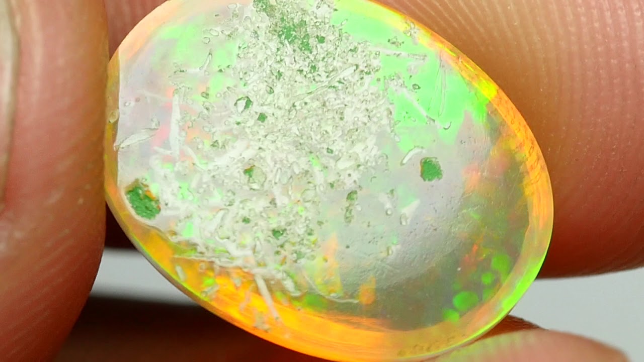 4.00 CRT TOP QOUALITY HONEYCOMB PATTERN WITH ROOT FOSSIL WOLO OPAL