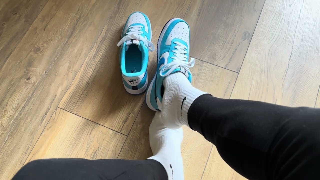 Blue Nike Air Force 1 sneakers with White Nike socks over leggings sporty outfit