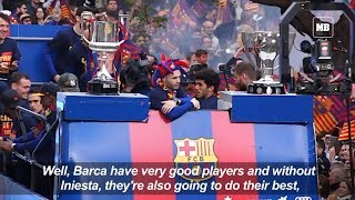 Ecstatic barcelona fans greet lionel messi and other players as they
parade the la liga copa del rey trophies through streets of city.