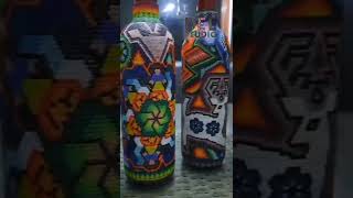 Botellas vino arte Huichol